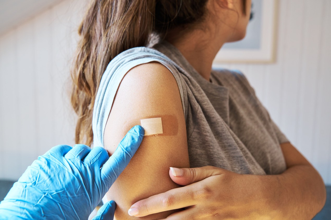 GettyImages-1335919773 A close up view of a woman getting vaccinated.