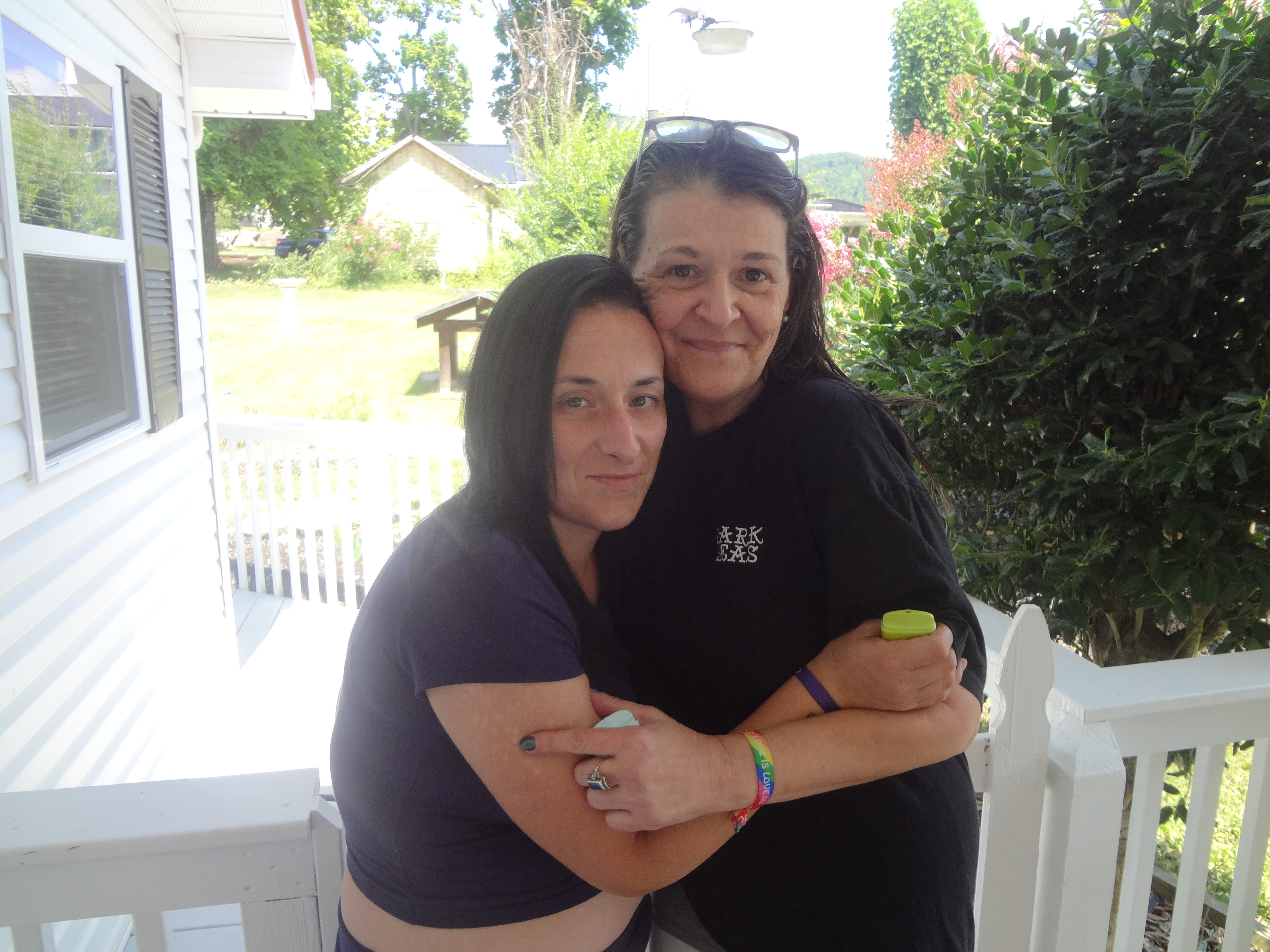 Syara-Parsell_Ronda-Morgan A pair of woman in black tshirts embrace